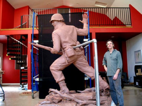 The Lone Soldier, clay sculpture on the studio with sculptor Jay Warren